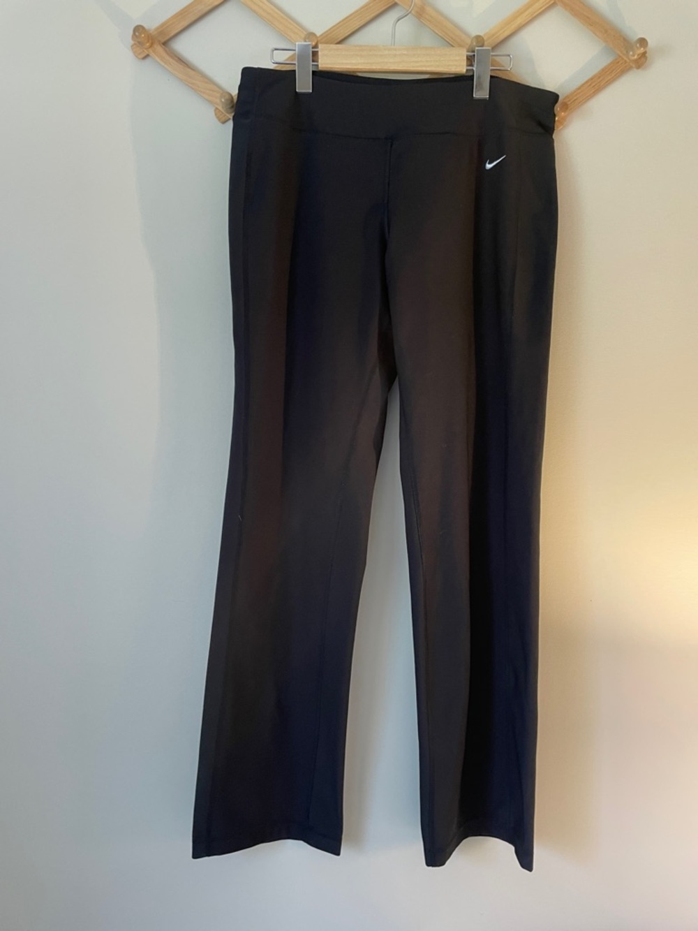 Nike women’s Black Boot-Cut Athletic Pants with White Swoosh size L